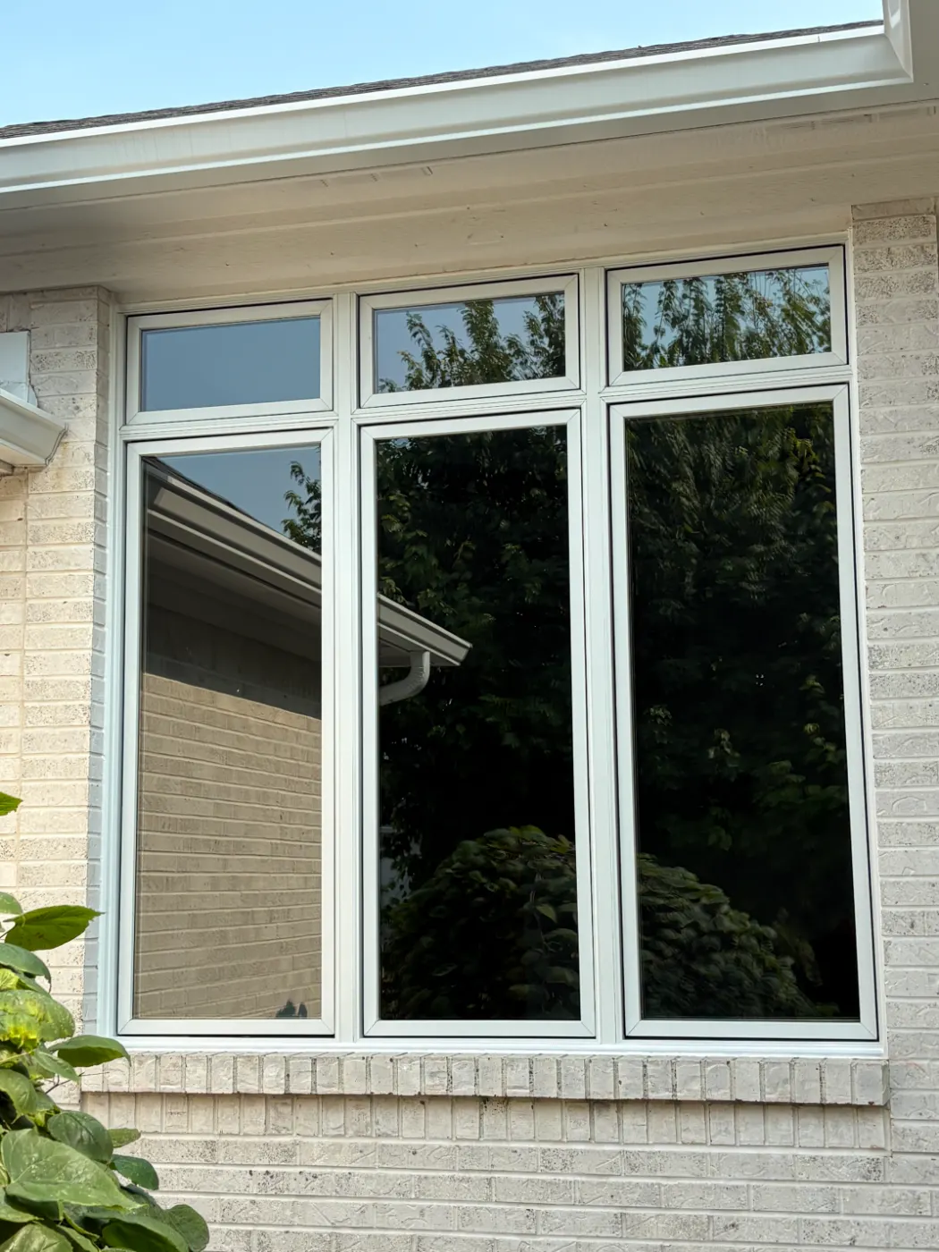 Storm-damaged window documented in Morgan Woods
